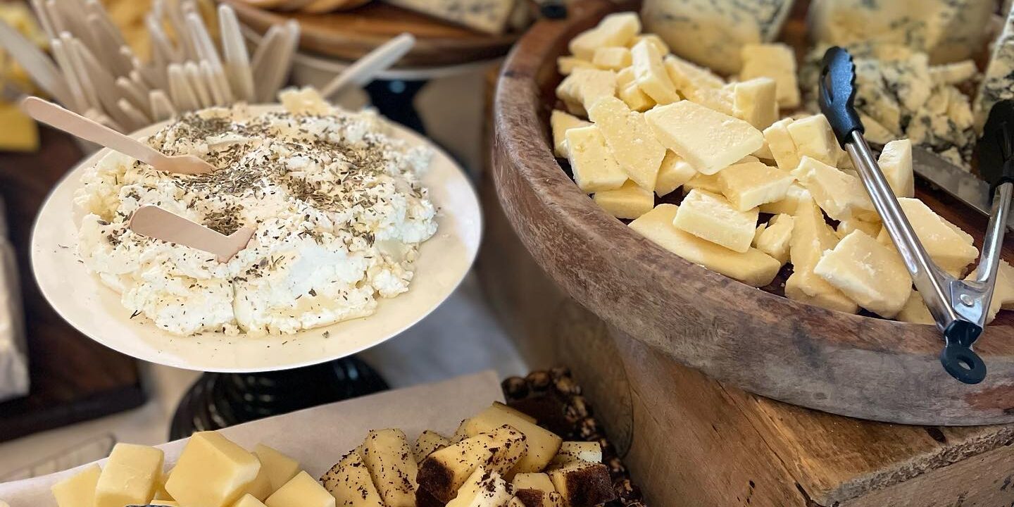 Variety of cheeses on a charcuterie board