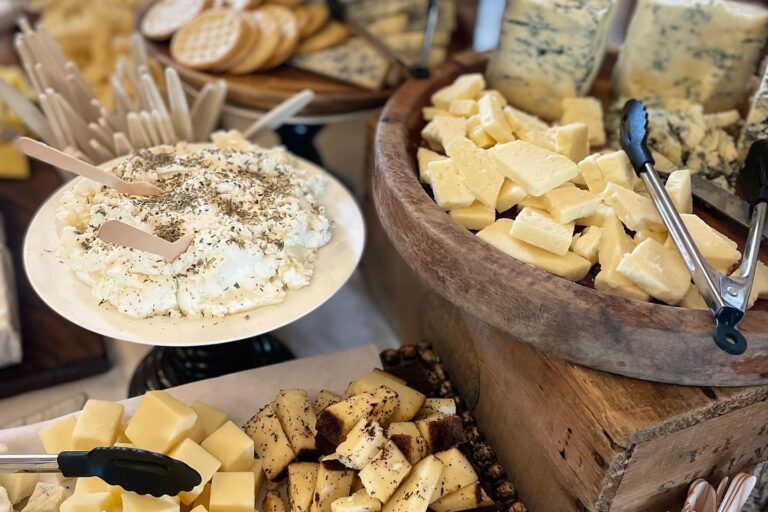 Variety of cheeses on a charcuterie board
