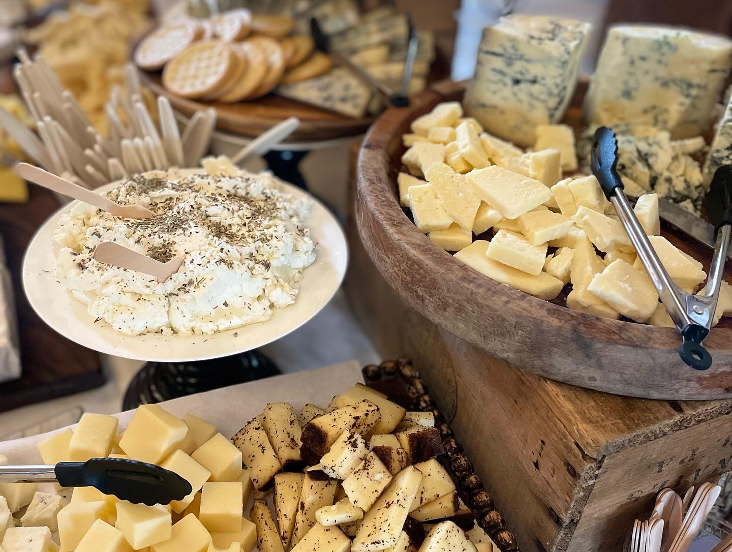 Variety of cheeses on a charcuterie board